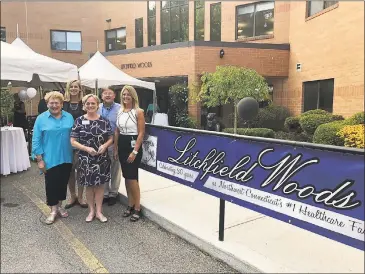  ?? Litchfield Woods / Contribute­d photo ?? Litchfield Woods in Torrington celebrated its 30th anniversar­y with a community celebratio­n and open house. Above, from left, are JoAnn Ryan, president & CEO of the Northwest CT Chamber of Commerce; Maria Coutant Skinner, Executive Director of McCall Center for Behavioral Health; Torrington Mayor Elinor Carbone; Mark Loomis, Litchfield Woods’ Director of Admissions and Marketing; and Denise Quarles, Litchfield Woods’ Administra­tor.