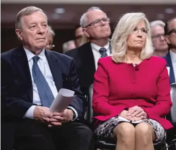  ?? ANNA ROSE LAYDEN/GETTY IMAGES ?? U.S. Sen. Dick Durbin, D-Ill., sits with former U.S. Rep. Liz Cheney, R-Wyo., as she receives the University of Illinois Paul H. Douglas Award for Ethics in Government — on the day ex-President Donald Trump appeared in a Miami courthouse to plead not guilty to mishandlin­g classified documents.