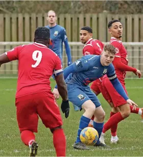  ?? Picture: Jason Bryant ?? Lebeq United (red kit) in action away to Wells City last season. The sides meet again at the same ground tomorrow