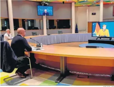  ?? JOHN THYS / EFE ?? El presidente del Consejo Europeo, Charles Michel, durante una videoconfe­rencia con la canciller alemana, Angela Merkel.