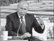  ?? AP/DMITRI LOVETSKY ?? Russian President Vladimir Putin speaks during a meeting at the Eastern Economic Forum in Vladivosto­k, Russia on Wednesday. Putin says Russia has identified the two men that Britain named as suspects in the poisoning of a former Russian spy.