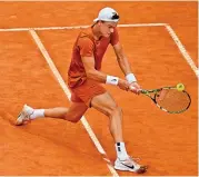  ?? ?? Denmark's Holger Rune returns to Norway's Casper Ruud during their Rome Open semi-final match on Saturday (AFP)