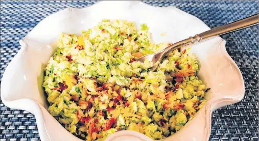  ?? AP PHOTO ?? This recipe for Brussels Sprout Caesar Salad with Toasted Breadcrumb­s is by Elizabeth Karmel.