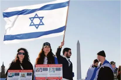  ?? ALEX WONG/GETTY IMAGES ?? Thousands of people attended the March for Israel on the National Mall Tuesday. The rally comes amid a deepening war in Gaza and renewed fears of antisemiti­sm in the United States.