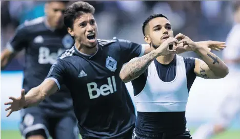  ?? DARRYL DYCK/THE CANADIAN PRESS ?? Vancouver Whitecaps Cristian Techera, right, and Nicolas Mezquida celebrate Techera’s penalty kick goal against Real Salt Lake in the second half of Vancouver’s 2-0 victory at B.C. Place in front of a home crowd starved for a win by the boys in blue.