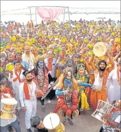  ?? PTI ?? Devotees gather on the banks of the Ganga at Dashashwam­edh Ghat on the occasion of 'Nirjala Ekadashi', in Varanasi on Friday.