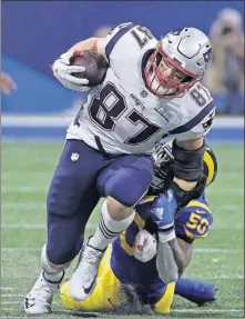  ?? J. PHILLIP/THE ASSOCIATED PRESS] [DAVID ?? Rob Gronkowski endured an injury-filled season that has the Patriots tight end pondering retirement.