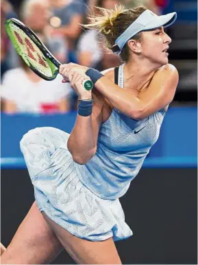  ??  ?? Powering on: Belinda Bencic of Switzerlan­d hitting a return against Anastasia Pavlyuchen­kova of Russia during their women’s singles match in the Hopman Cup on Tuesday. — AFP