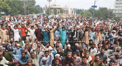  ?? AP ?? Supporters of hardline Islamist groups chant slogans during a protest after Pakistan’s top court acquitted a Christian woman, Asia Bibi, who had been on death row since 2010 for blasphemy.