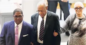  ?? AP PHOTOS ?? Andrew Wyatt (left), Bill Cosby (centre) and Cosby’s wife, Camille, enter the Montgomery County Courthouse.