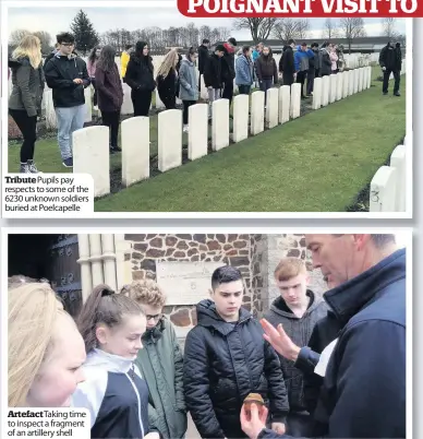  ??  ?? Tribute Pupils pay respects to some of the 6230 unknown soldiers buried at Poelcapell­e Artefact Taking time to inspect a fragment of an artillery shell