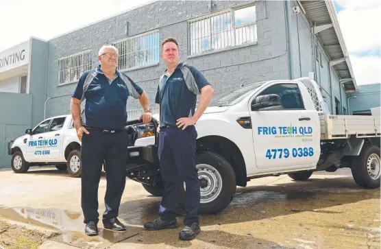  ?? Picture: SCOTT RADFORD- CHISHOLM ?? HANDING OVER: Ron Stallard and Steve Jensen outside the Frig Tech premises in Rendle St, Aitkenvale.