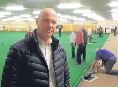  ?? Picture: Kim Cessford. ?? Councillor Derek Wann inside Arbroath Indoor Bowling Club, which will have to find £60,000 to remove asbestos from its roof.