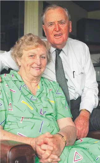  ??  ?? Sir Joh Bjelke-Petersen and wife Lady Flo in 1994 and with her famous scones.