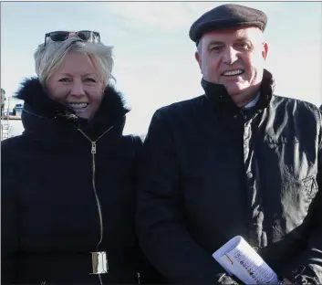  ??  ?? Caroline and Aidan Sutton from Blackwater at the final race meeting of 2016 in Bettyville on Tuesday.