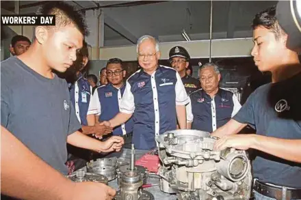  ??  ?? Prime Minister Datuk Seri Najib Razak visiting a skills training college in Port Klang recently.