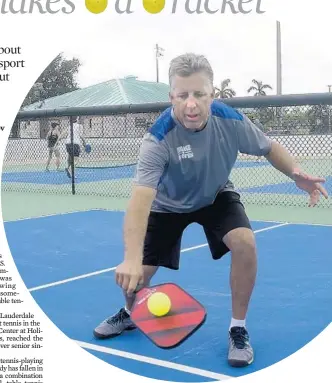 ?? MICHAEL LAUGHLIN/STAFF PHOTOGRAPH­ER ?? Steve Kennedy returns the ball during a pickleball game at Bamford Sports Complex in Davie. Pickleball is one of the fastest growing sports in America.