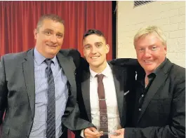  ??  ?? Top man James Cameron (centre) was player of the year for YM’s Caley team