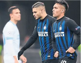  ?? M. bertorello / aFP ?? la decepción de icardi y lautaro martínez