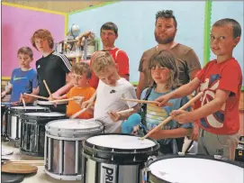  ??  ?? The drumming group was a popular class.