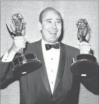  ?? Associated Press ?? CARL REINER displays a pair of writing Emmys for his work on the 1960s sitcom he created, “The Dick Van Dyke Show.”