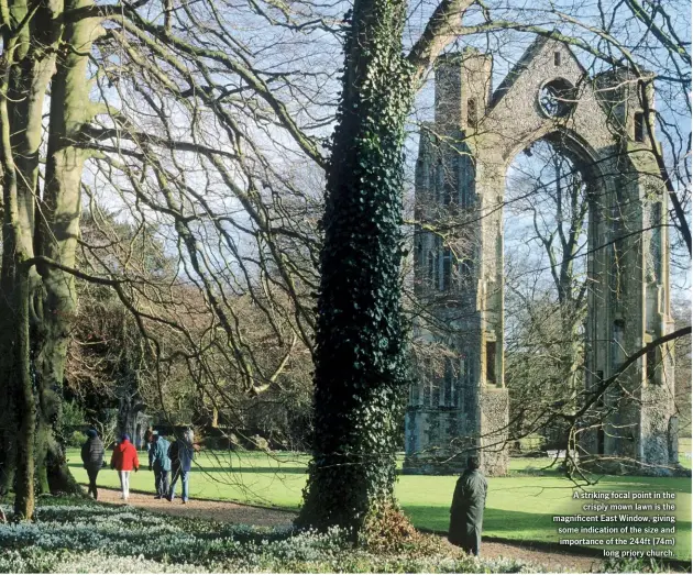  ??  ?? A striking focal point in the crisply mown lawn is the magnificen­t East Window, giving some indication of the size and importance of the 244ft (74m) long priory church.