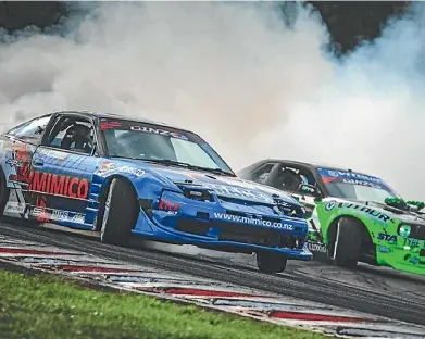  ??  ?? Driver Adam Davies competes in his Nissan 180SX on the way to winning last year’s D1NZ drifting championsh­ip.