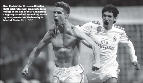  ?? Photo: VCG ?? Real Madrid star Cristiano Ronaldo (left) celebrates with teammate Jesus Vallejo at the end of their Champions League quarterfin­al second-leg match against Juventus on Wednesday in Madrid, Spain.