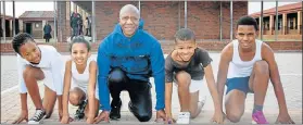  ?? Picture: RICHARD PEARCE PHOTOGRAPH­Y ?? READY TO RUN: Legacy Project coordinato­r Sithembile Mpako with Missionval­e Primary School’s eager team of, from left, Zukhanye Gcaza, 11, Carlin van der Berg, 13, Jason Fourie, 14, and Azile Kondile, 14, who are ready to compete in the 5km event in...