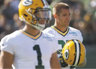 ?? Morry Gash / Associated Press 2017 ?? Ex-Green Bay wide receiver Jordy Nelson (right) reportedly was greeted at the airport by Raiders quarterbac­k Derek Carr, among others, during Wednesday’s visit with the team.