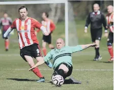  ??  ?? Boldon Colliery Old Barrel nick the ball away from Sunderland Mill View.