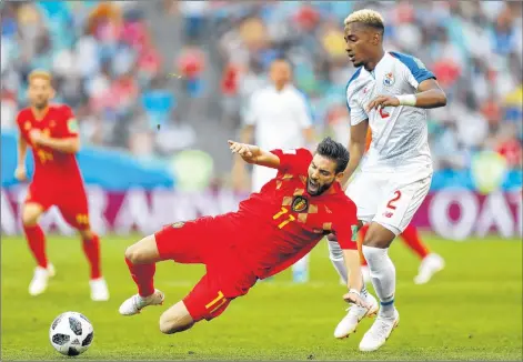  ?? AP PHOTO ?? Belgium’s Yannick Carrasco, left, and Panama’s Michael Murillo challenge for the ball during the group G match between Belgium and Panama at the 2018 soccer World Cup in Fisht Stadium in Sochi, Russia, Monday.