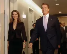  ?? AP FIle ?? BOYS BEHAVING BADLY: Then Gov.-elect Arnold Schwarzene­gger and his wife, Maria Shriver, smile as they walk to a meeting of his transition committee in Sacramento, Calif., on Nov. 16, 2003. In an interview with ‘60 minutes’ at the time, he said the affair he had with longtime housekeepe­r Mildred Baena, that led to a son, was ‘the stupidest thing’ he ever did to then-wife Shriver.