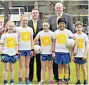  ??  ?? FUN Colin Donnelly and John Horan with kids at Belfast City Hall yesterday