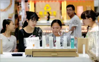  ?? PROVIDED TO CHINA DAILY ?? Cosmetics on sale at a department store in Langxi county, Anhui province, attract consumers.