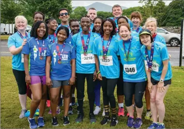  ??  ?? RIGHT: Kerry Sanctuary runners Angela Flynn, Yolonda Mhene, Emma Ngulube, Abigail Ndlovu, Valentina Havawa, Muhammad Majid, Sibusisiwe Mhlophe, Itangishak­a Jimmy Juma, John Sheahan, Sithandiwe Moyo, Adrian Mwenje, Graham Clifford, Wongwa Giqwa, Nan...