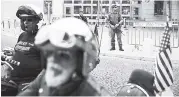  ?? AP ?? Security personnel stand guard as riders from the Samson Riders, an Israeli motorcycle club, arrive at the new US Embassy on a group ride from the old embassy in Tel Aviv, ahead of the official opening in Jerusalem on Sunday.