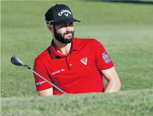  ?? BRYNN ANDERSON / THE ASSOCIATED PRESS ?? Abbotsford’s Adam Hadwin, the only Canadian in the field at the PGA Championsh­ip, watches his shot to the fourth green on Thursday at Bellerive Country Club in St. Louis. Hadwin fired a 1-over 71 in the opening round.