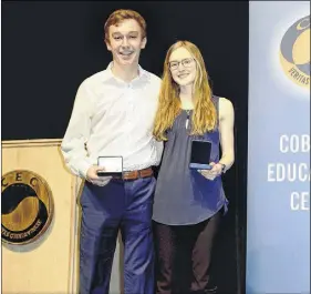  ?? CONTRIBUTE­D PHOTO ?? CEC presented Joel Richards with the 2018 Queen Elizabeth Medal and Kathryn Macquarrie with the Governor General’s Medal. Although they graduated in June, the medals couldn’t be presented at that time because  nal marks for IB students aren’t available until late summer.