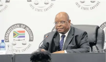  ?? KAREN SANDISON African News Agency (ANA) ?? DEPUTY Chief Justice Raymond Zondo presiding over the Commission of Inquiry into State Capture. The Prevention and Combating of Corrupt Activities Act covers any person or institutio­n allegedly involved in any corrupt activities. |