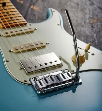  ??  ?? There’s no ID on any of the pickups but this potted bridge humbucker, with its nickel-plated cover, uses an Alnico 5 magnet and has a DCR of 8.9k ohms. In the middle/bridge mix position it’s split to voice the screw coil. Like Suhr, and others, Vola use the Gotoh 510 vibrato