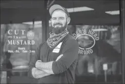  ?? BEA AHBECK/NEWS-SENTINEL ?? Cut the Mustard’s new owner, Ben Holcomb, is pictured at the Lodi sandwich shop on Friday.