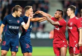  ??  ?? Alfredo Morelos, second-right, proved a handful in the first leg in Denmark