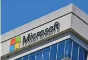  ??  ?? Microsoft logo adorns a building in Chevy Chase, Maryland. Some 38 million records stored on a Microsoft service, including private informatio­n, were mistakenly left exposed this year, security firm UpGuard said.