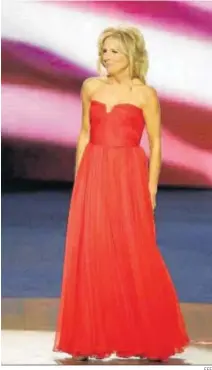  ?? EFE ?? Vestido rojo que llevó en 2009, cuando Obama ganó los comicios.