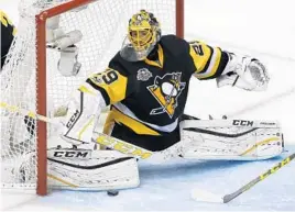  ?? GENE J. PUSKAR/ASSOCIATED PRESS ?? Pittsburgh Penguins goalie Marc-Andre Fleury had stopped 133 of 142 shots through four games before giving up 4 on 32 shots in Game 5 as Washington forced Game 6 tonight.