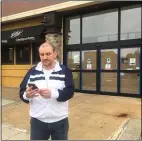  ?? PETE BANNAN - MEDIANEWS GROUP ?? Mike O’Neill of Broomall attempts to order liquor over the phone from the Pennsylvan­ia Wine and Spirits in Pilgrim Gardens.