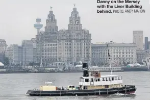  ?? PHOTO: ANDY MAHON ?? Danny on the Mersey with the Liver Building behind.
