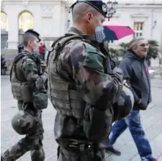  ??  ?? NICE: French soldiers patrol in Nice, southeaste­rn France, yesterday, ahead of the 133rd edition of the Nice Carnival.