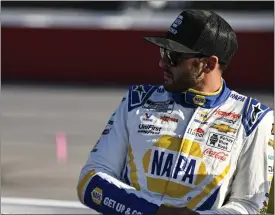  ?? MATT KELLEY — THE ASSOCIATED PRESS ?? Chase Elliott looks on prior to a NASCAR Cup Series race at Darlington Raceway On Sept. 3 in Darlington, S.C.